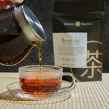 Mizuba Tea's Benifuki Tea being poured in glass cup