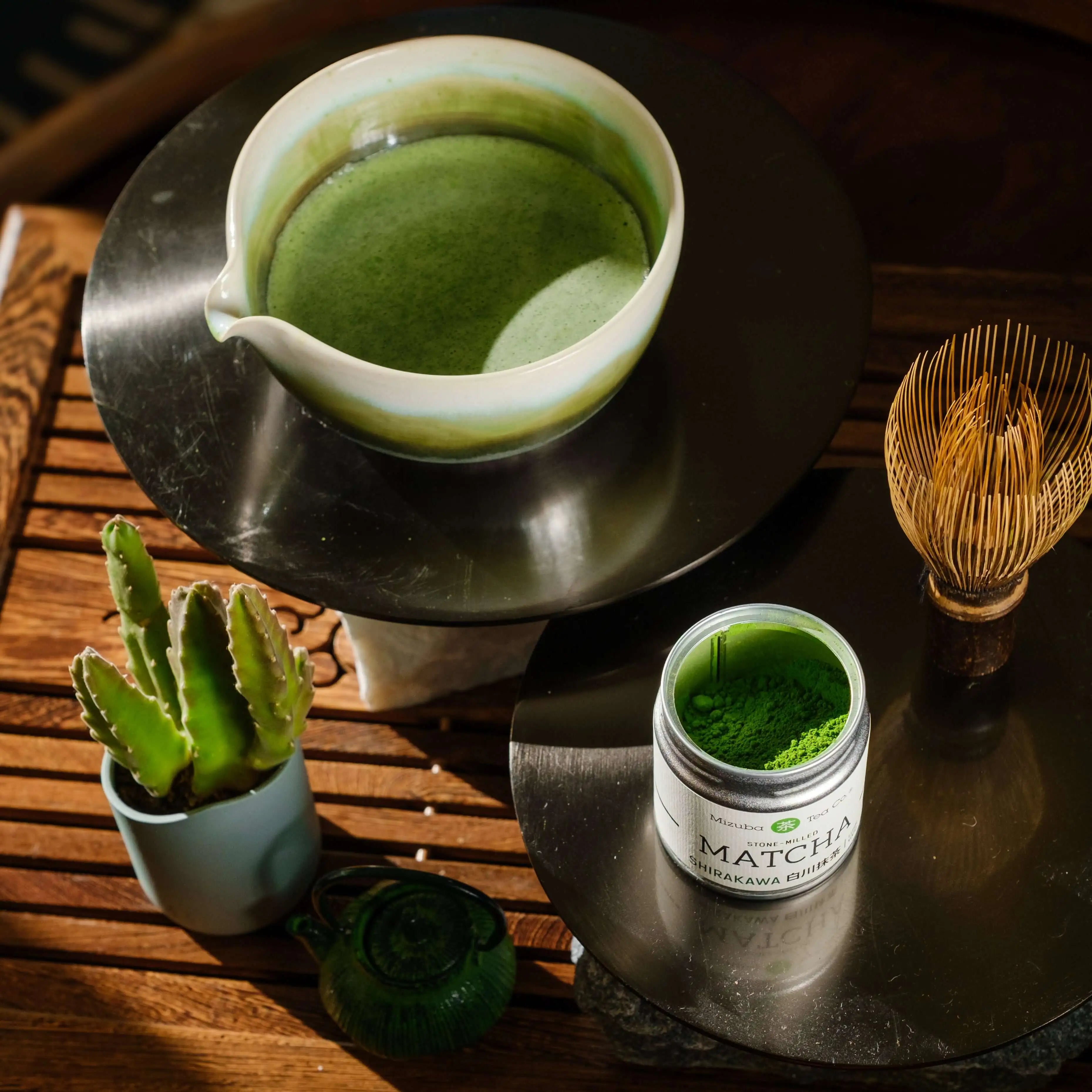 Shirakawa Matcha by Mizuba Tea Co. featured next to a spouted ceramic chawan bowl