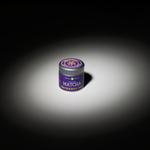 Asahi Matcha powder tin on a white table