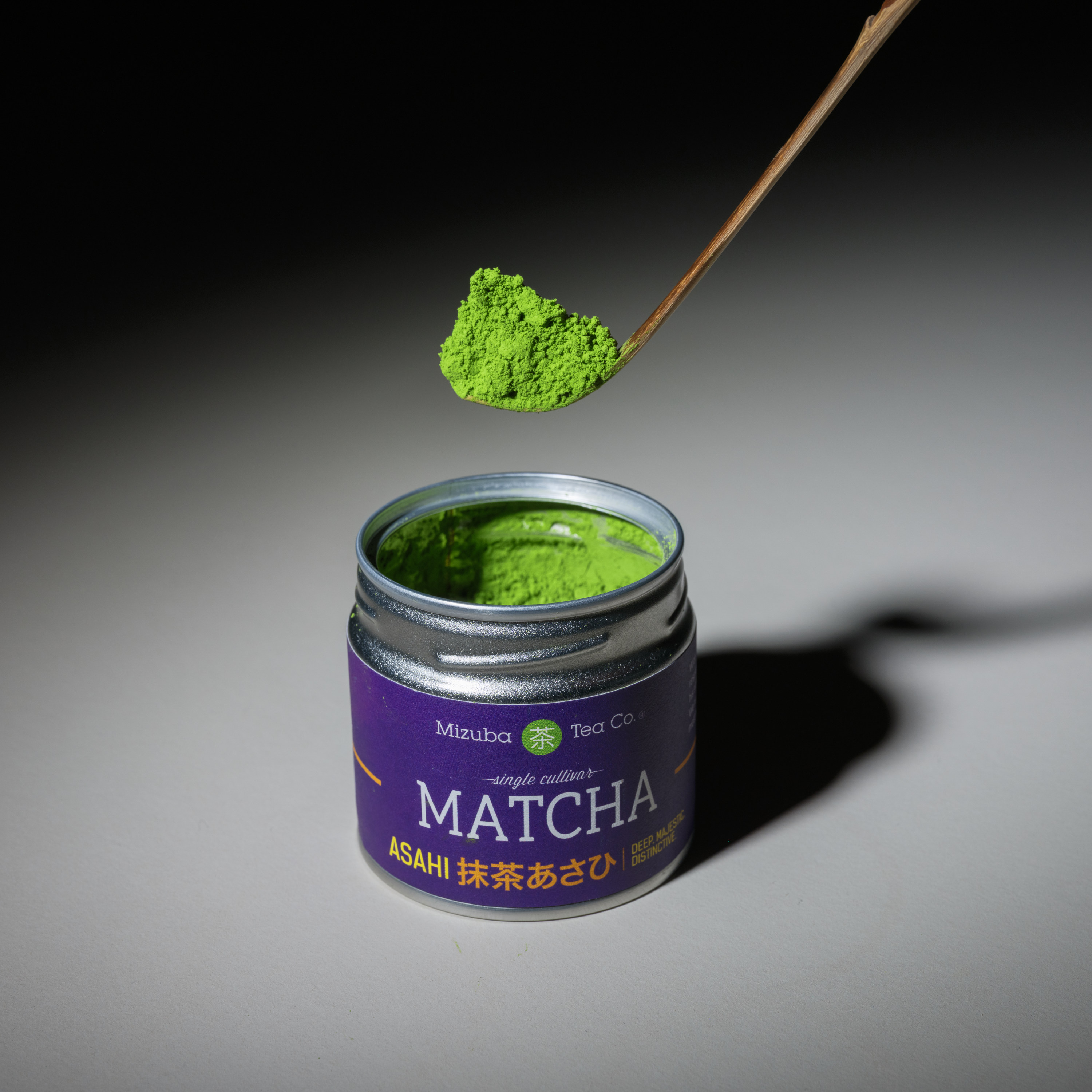 Matcha scoop with Asahi Matcha powder tin