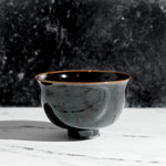 Black porcelain chawan matcha tea bowl on a table – Mizuba Tea Co. 
